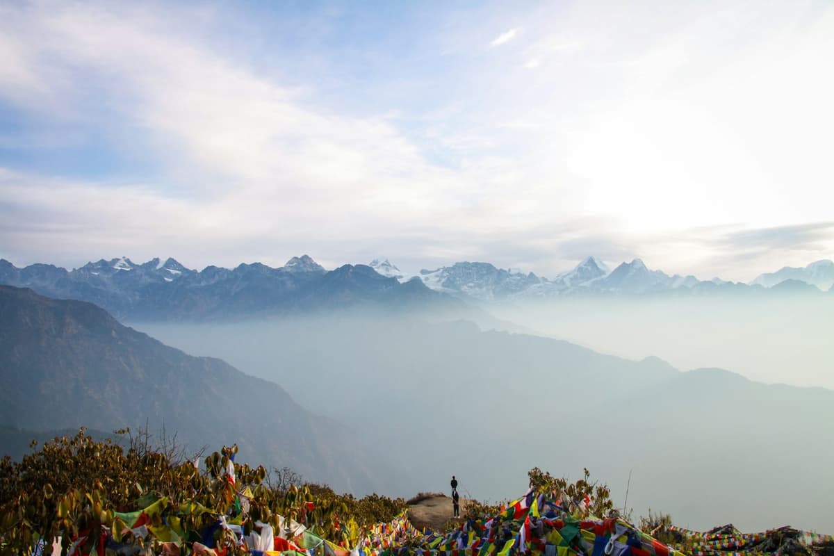Himalayan peaks above the clouds from Ama Yangri in Helambu