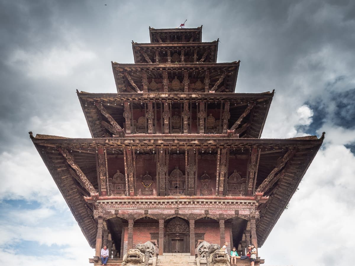 The five-storey Nyatapola Temple in Bhaktapur with its stone guardian statues, a highlight of the three Durbar Squares tour near Kathmandu.