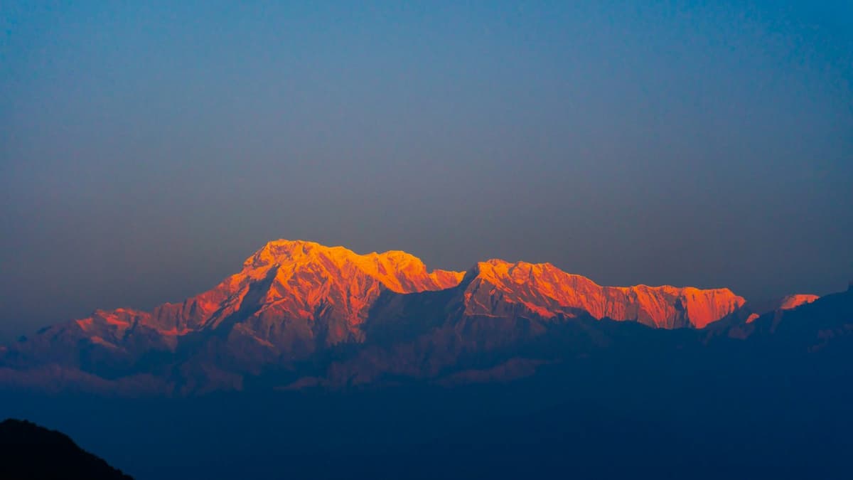 Sunrise glow on the Annapurna range from Sarangkot on the Bandipur Pokhara Kathmandu tour