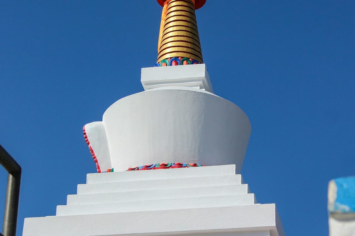 A white stupa on the ridge above Dhulikhel on the Dhulikhel and Namobuddha tour