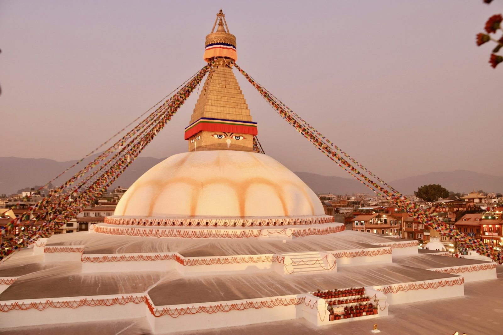 Boudhanath Stupa glowing in the evening light, visited before the Pashupatinath aarti on the Bagmati.
