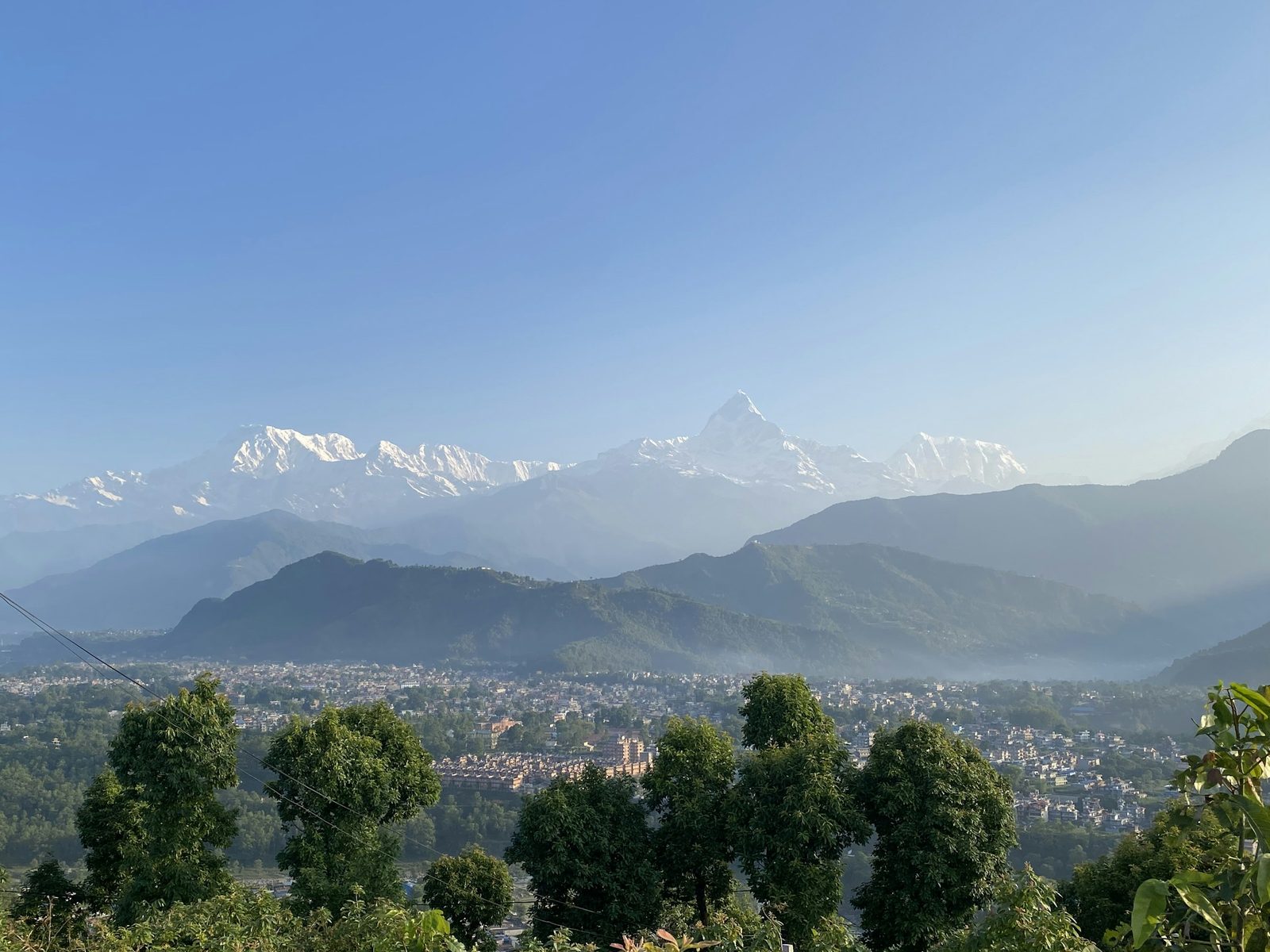 Annapurna range and Machhapuchhre above Pokhara from Sarangkot on the Bandipur Pokhara Kathmandu tour