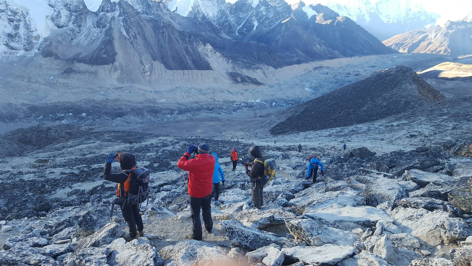 Trekkers crossing the Khumbu Glacier moraine on the Everest Base Camp trek