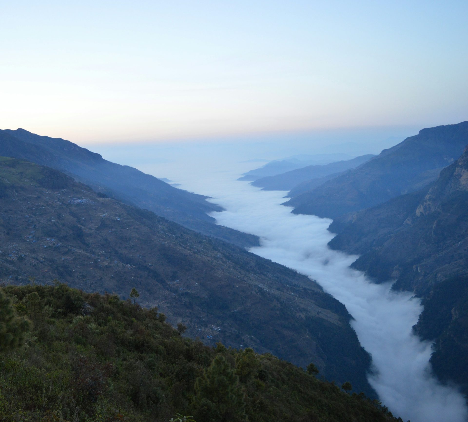 Clouds filling the valley below the Gorkha hills