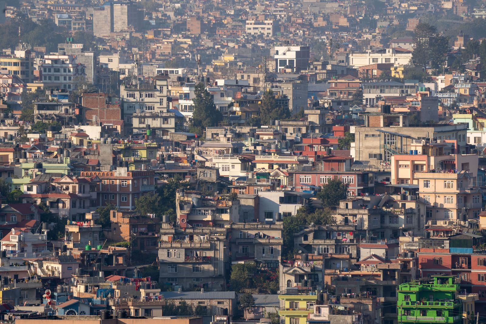 The Kathmandu Valley and its rooftops seen from the hill at Swayambhunath at the end of the Kathmandu walking tour.