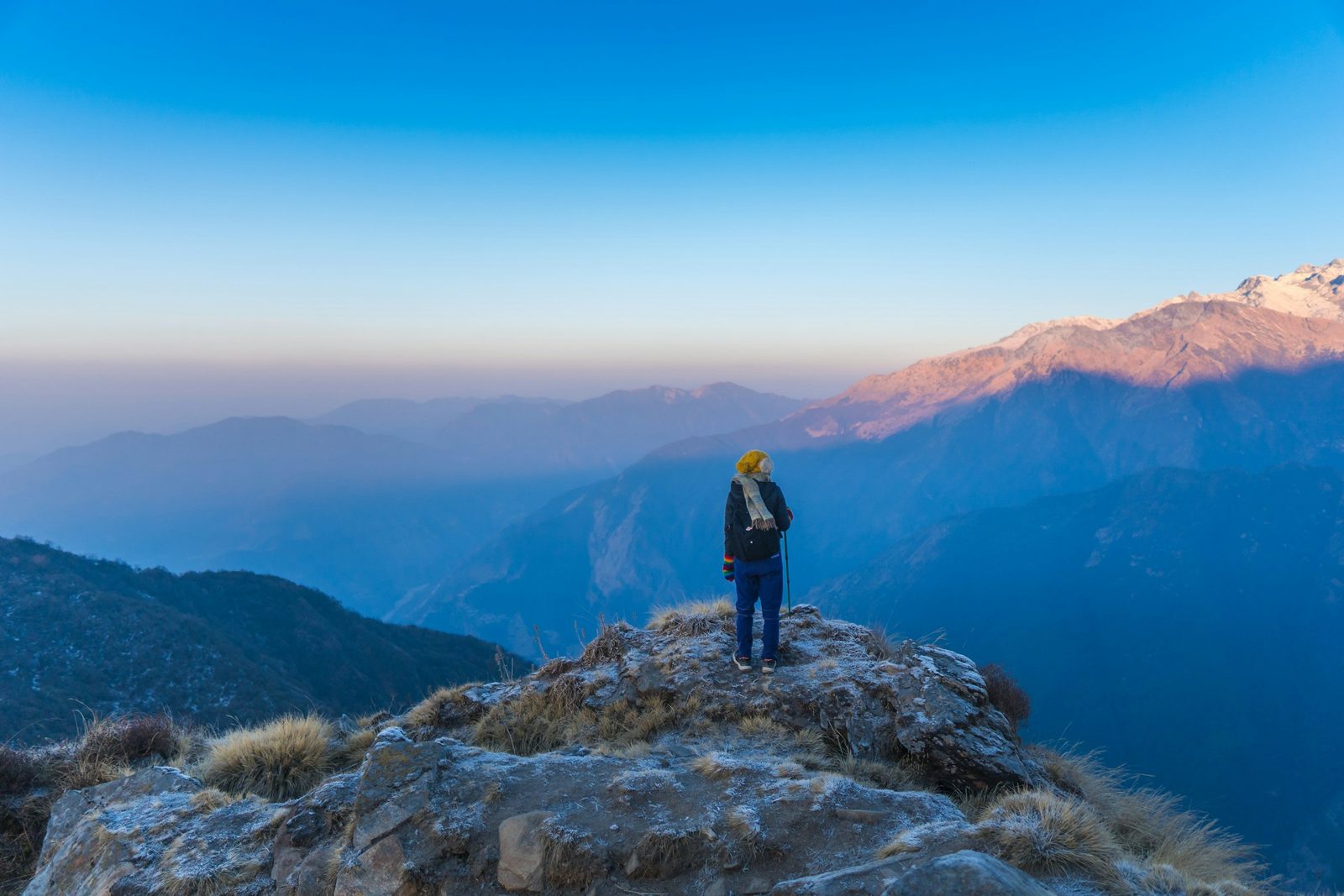 A trekker on the Mardi Himal ridge at dawn on the Mardi Himal trek from Kathmandu