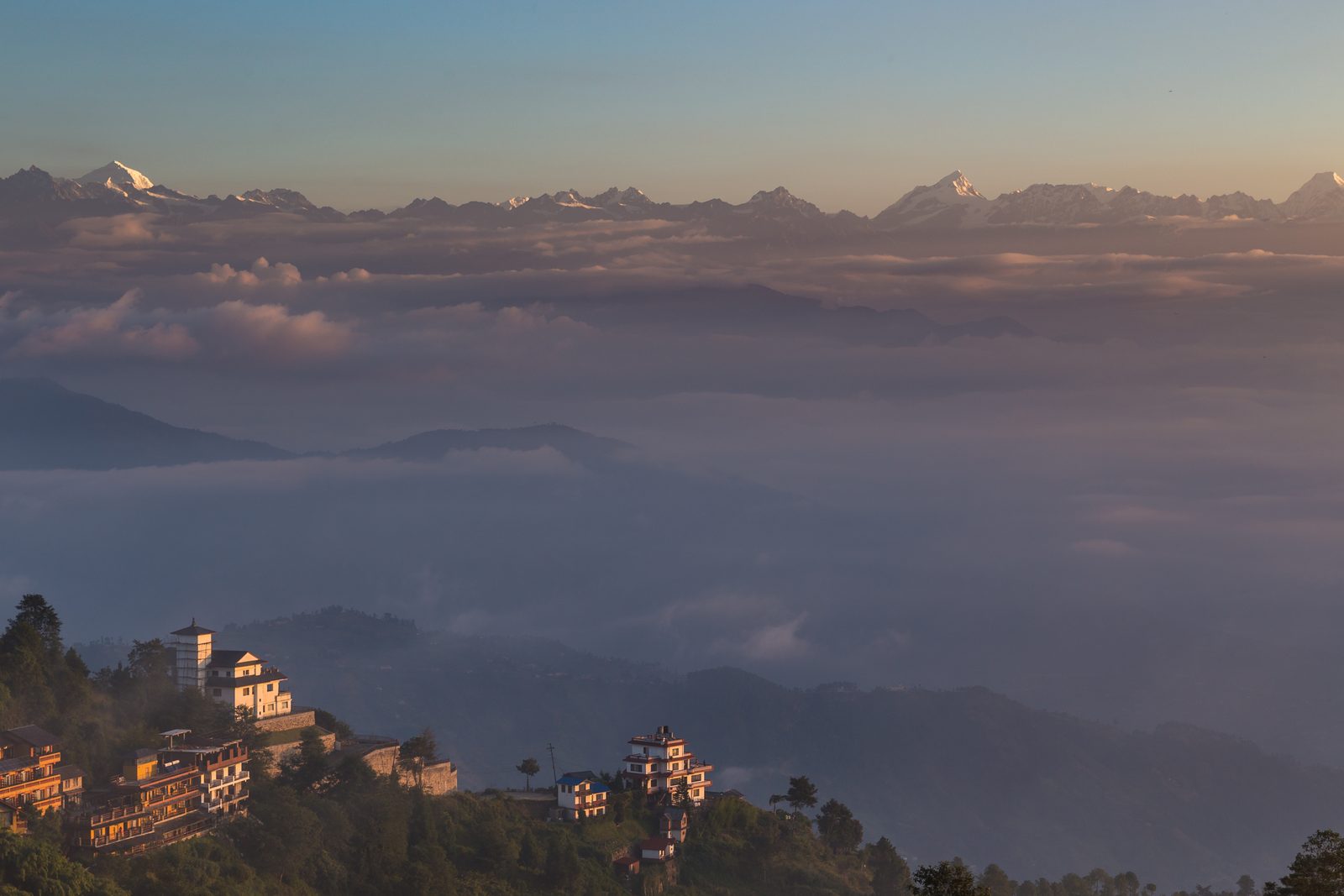 Snow peaks above a sea of cloud from Nagarkot, seen on the Changu Narayan to Nagarkot hike.