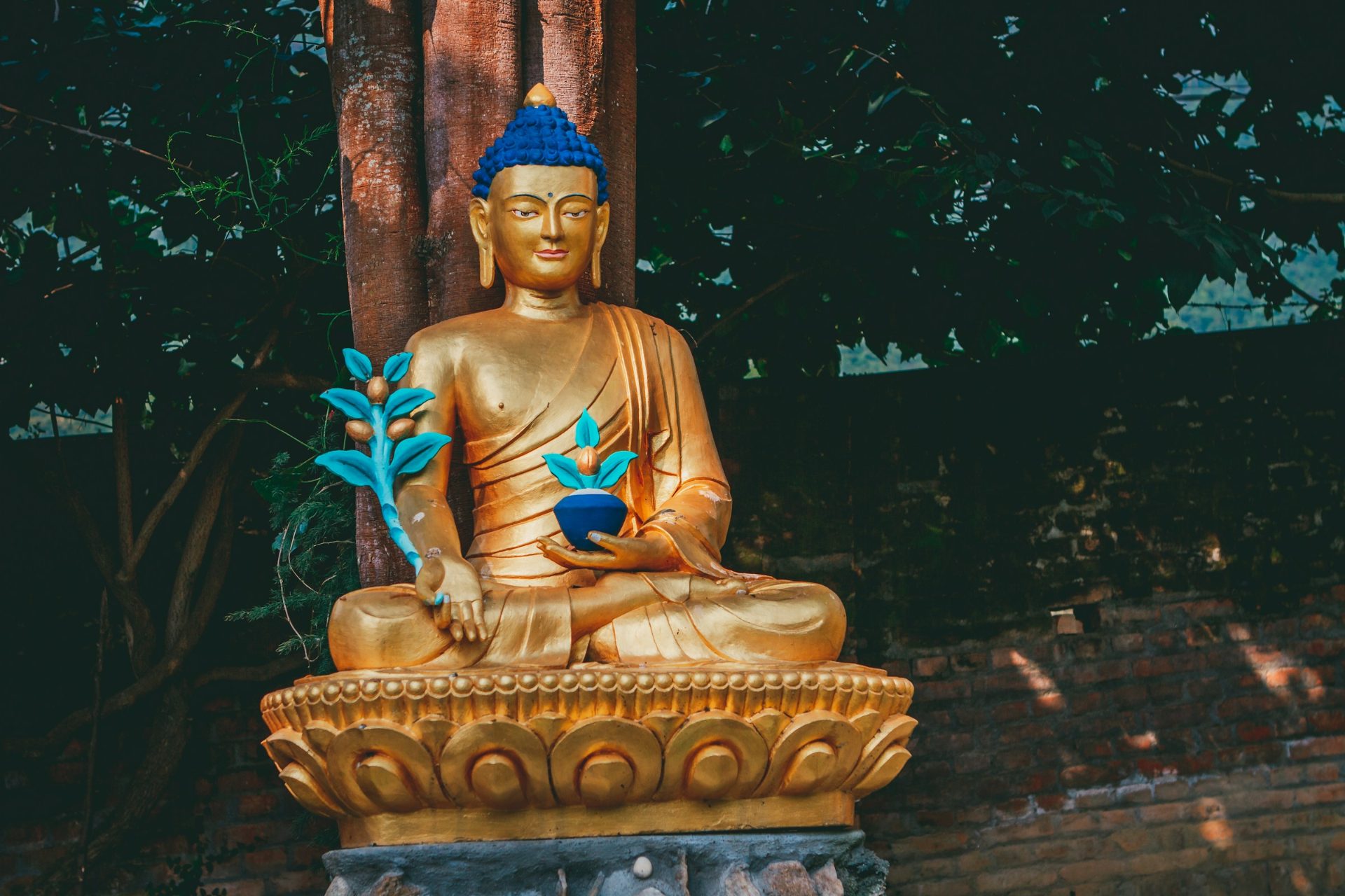 A golden Buddha statue at Pharping